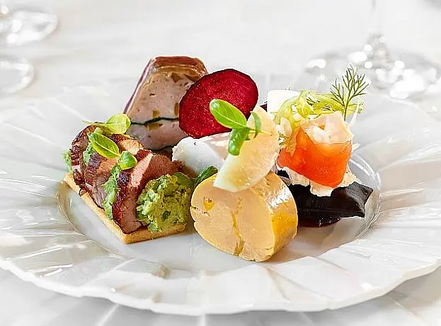 Artfully plated, gourmet Walachian dish. Gastronomic experiences on European tours -- Azzurytt Traditional Flavors