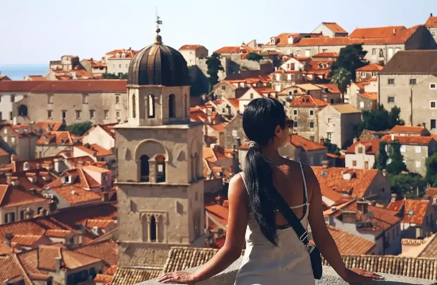 Lady admiring Dubrovnik city's skyline