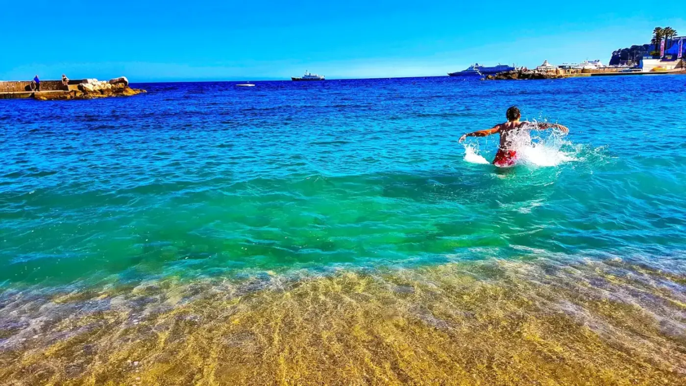 Child relaxing in Mediterranean Sea. Monaco Bespoke Luxury Planning — Azzurytt Travel Advisory