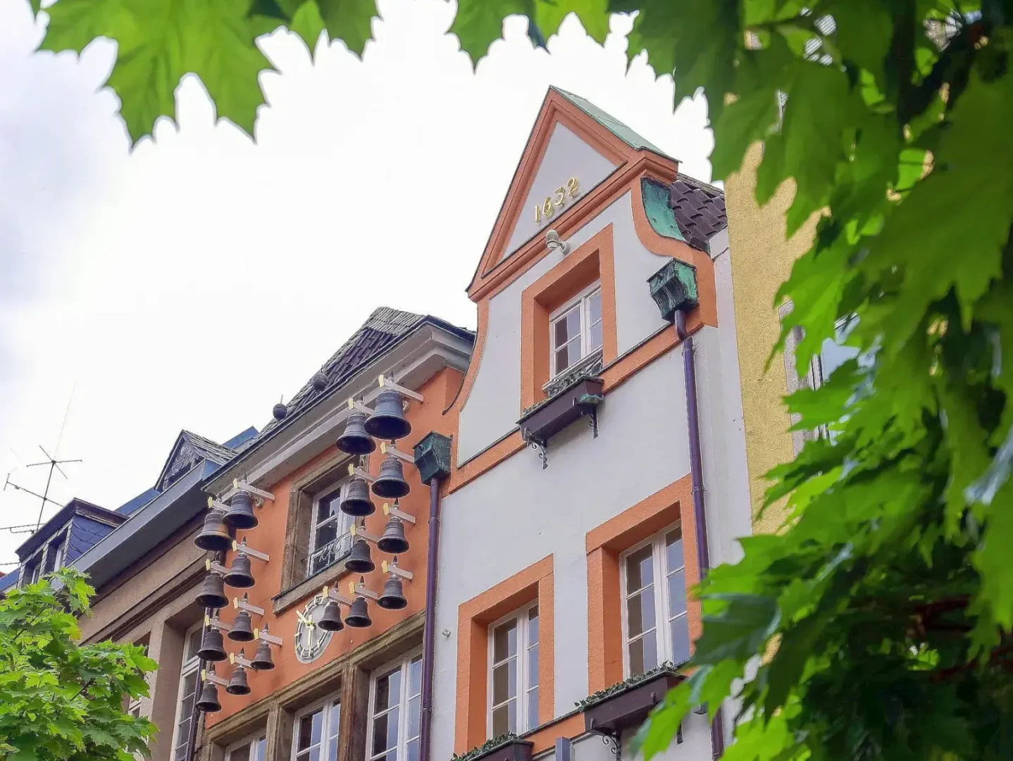 Dusseldorf historic building with bells. Romantic Germany private journeys -- Azzurytt Bespoke Europe Tours
