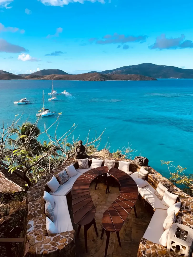 High-end resort terrace overlooking yachts at sea -- A signature setting on any Azzurytt bespoke European cultural tour